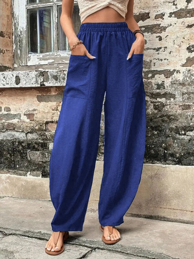 Pantalones harem de corte relajado Isabella Sol con bolsillos