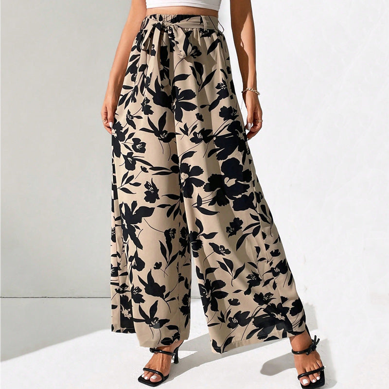 Pantalones de talle alto y pierna ancha con estampado floral de Isabella Sol.