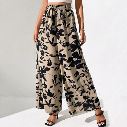 Pantalones de talle alto y pierna ancha con estampado floral de Isabella Sol.