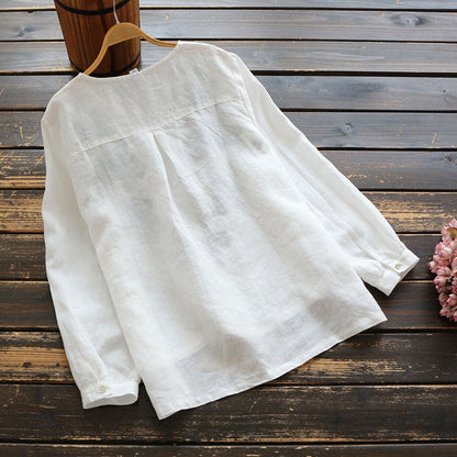 Top vintage de lino bordado con escote en V de Isabella Sol.