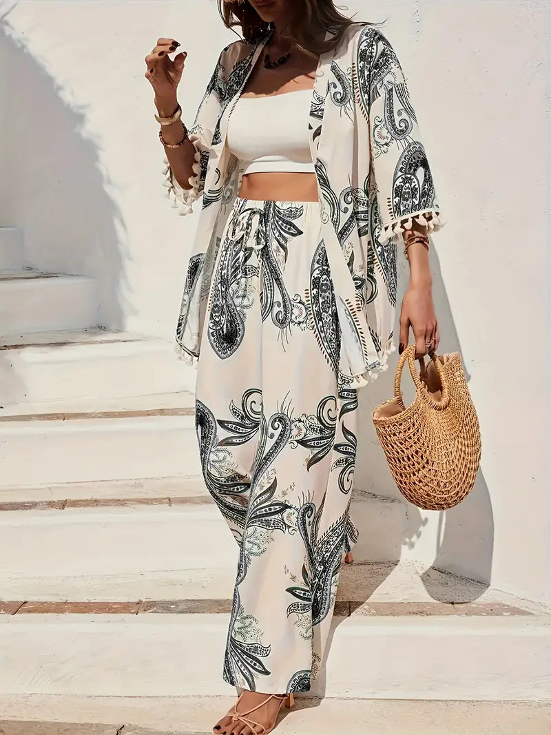 Elegante conjunto de cárdigan y pantalón estampado de Isabella Sol.