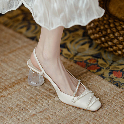 Elegantes sandalias de tacón de cristal de Isabella Sol