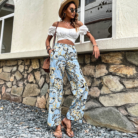 Pantalones rectos con estampado floral de Isabella Sol