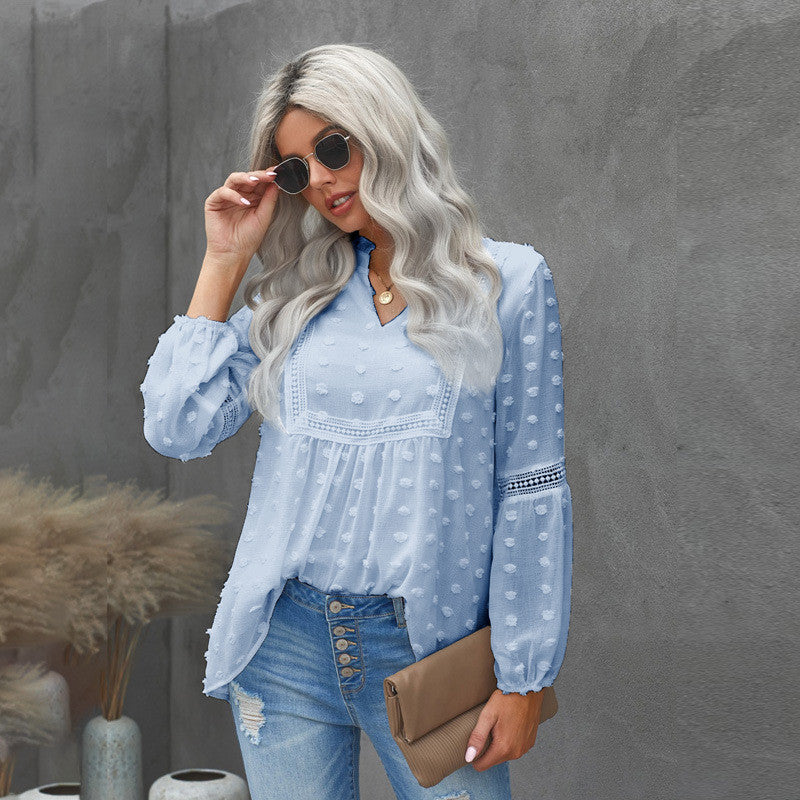 Blusa elegante de encaje con escote en V de Isabella Sol