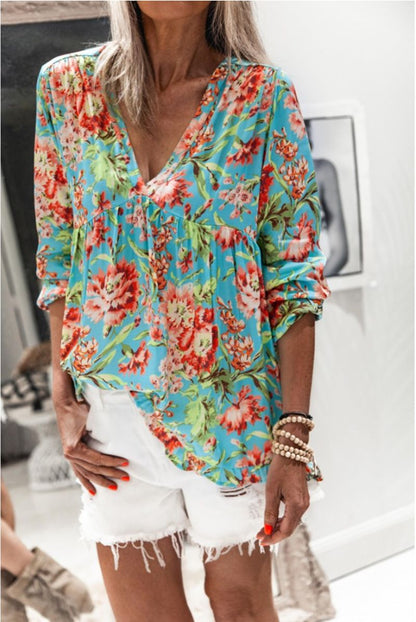 Blusa de manga larga Isabella Sol con estampado floral vibrante
