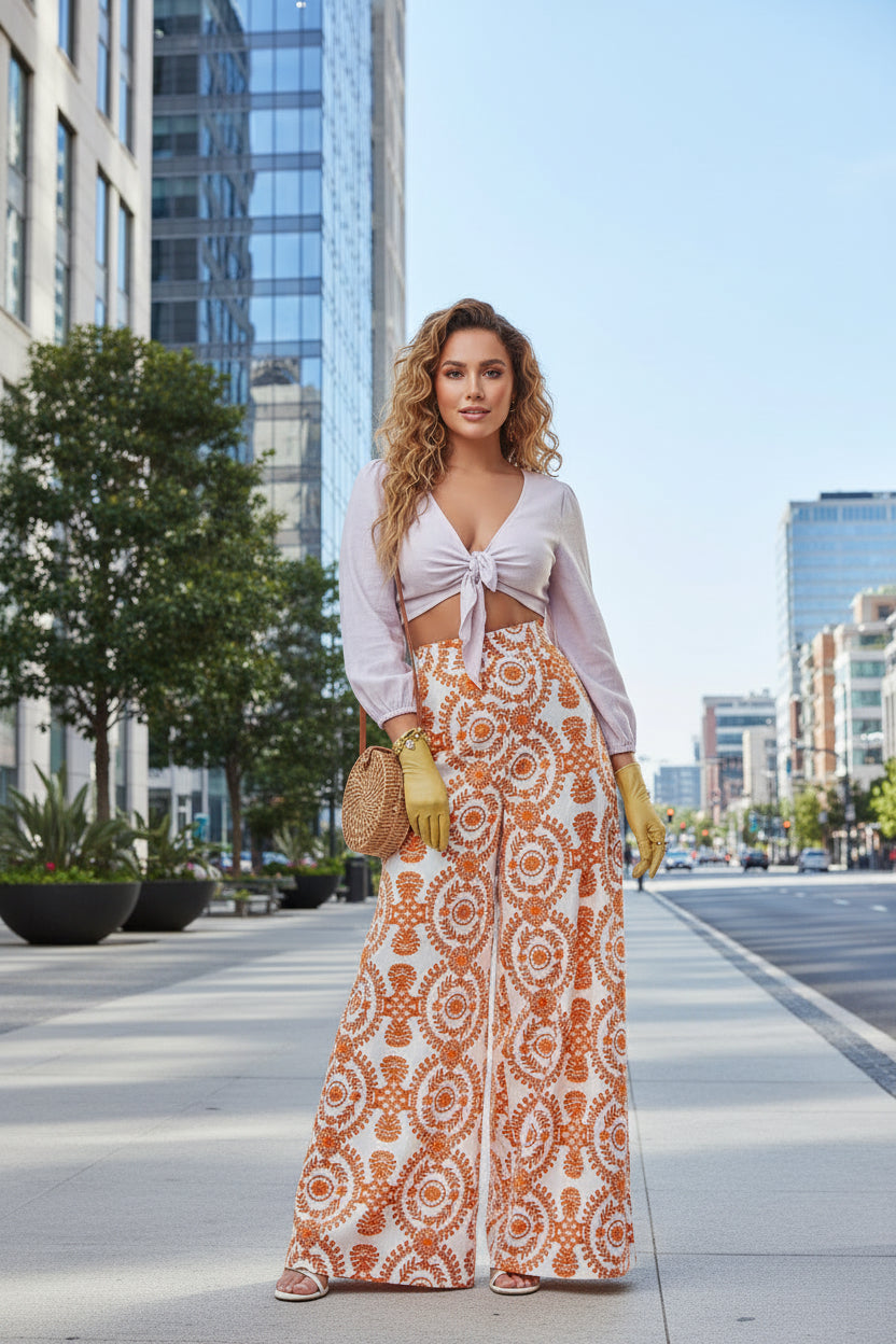 Pantalones acampanados Isabella Sol con estampado vibrante