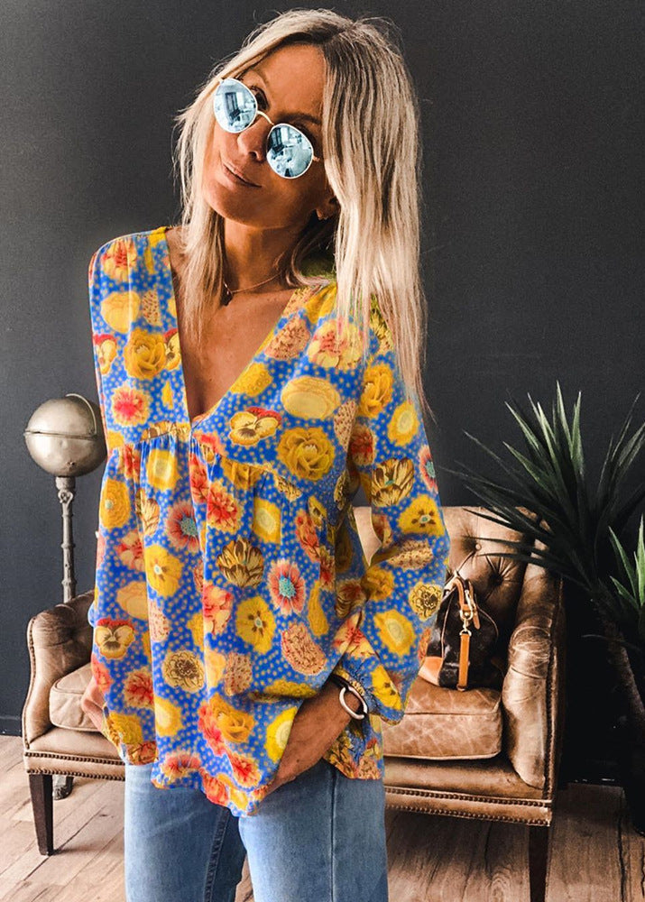 Blusa de manga larga Isabella Sol con estampado floral vibrante