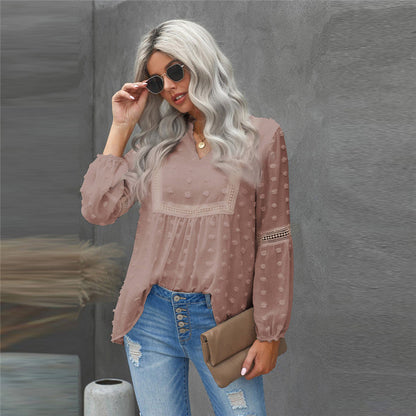 Blusa elegante de encaje con escote en V de Isabella Sol