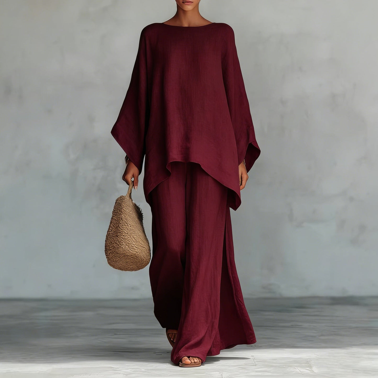 Conjunto minimalista de top de corte relajado y pantalón de pierna ancha para mujer.