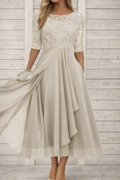 Elegante vestido de noche midi de encaje de Isabella Sol