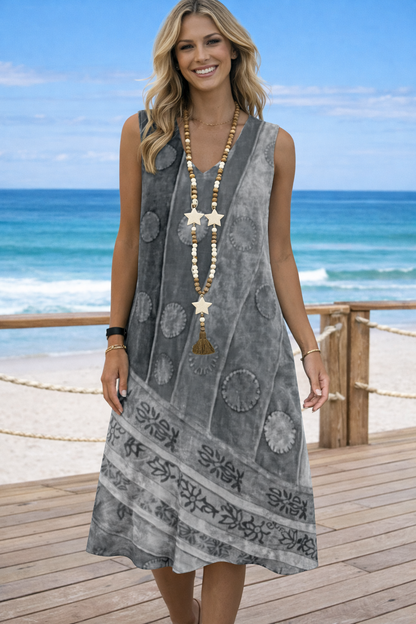 Vestido estampado vibrante con escote en V de Isabella Sol.