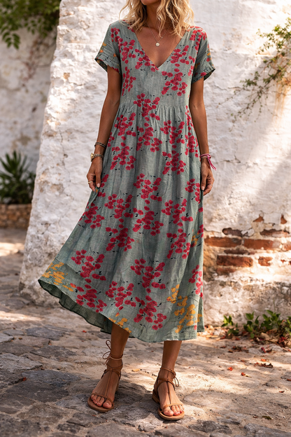 Vestido largo de algodón con escote en V y estampado floral de Isabella Sol.