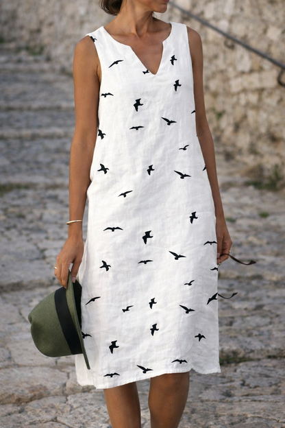 Elegante vestido de verano con estampado de pájaros de Isabella Sol.