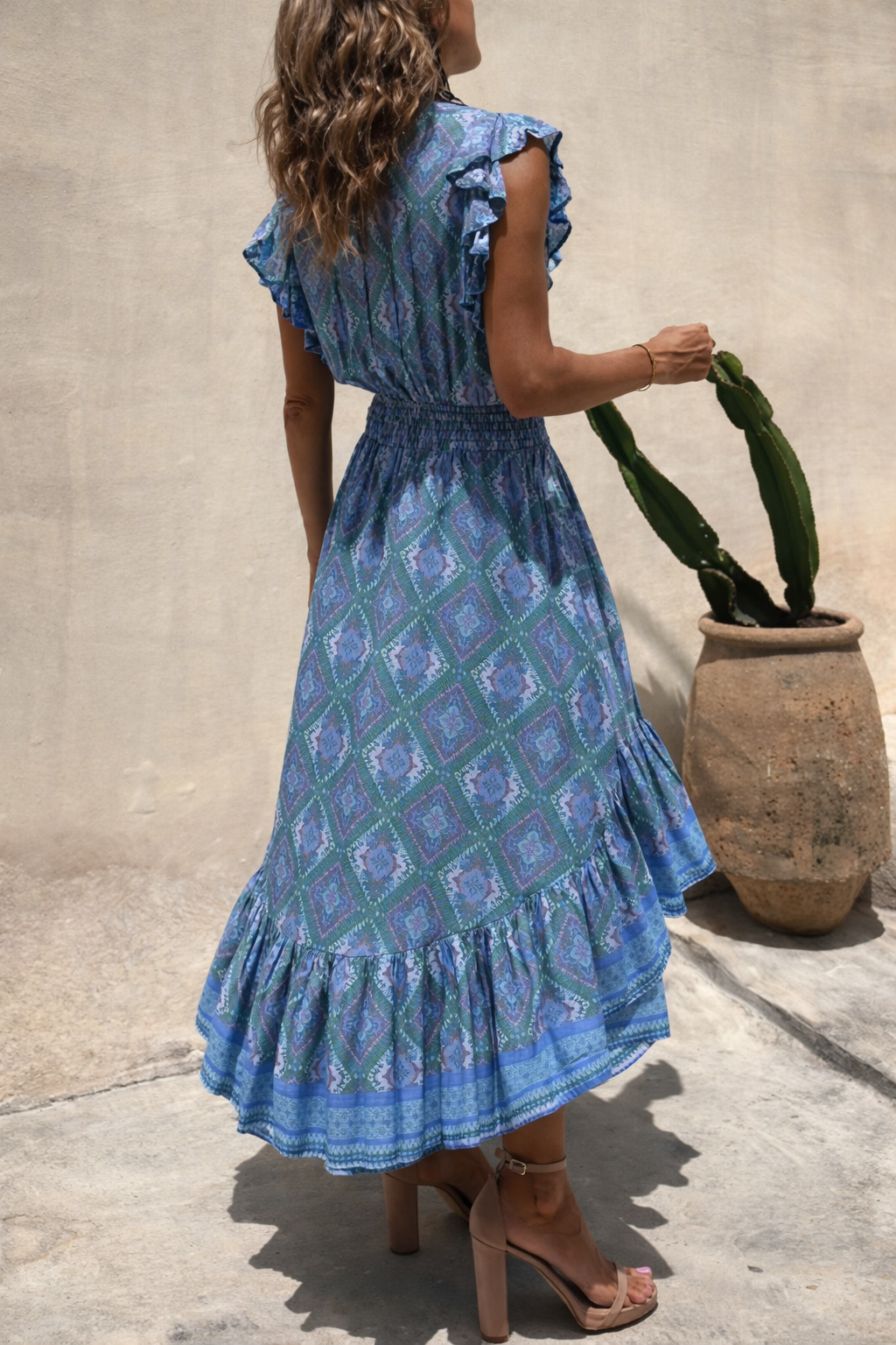 Vestido largo de manga acampanada con estampado bohemio de Isabella Sol