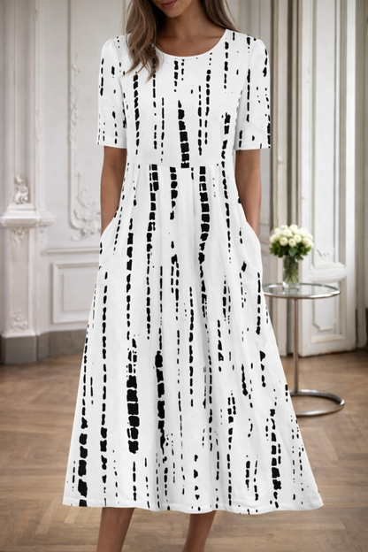 Vestido de cuello redondo con estampado floral de Isabella Sol