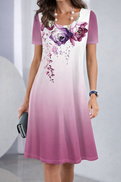 Vestido de verano de largo medio con estampado floral de Isabella Sol