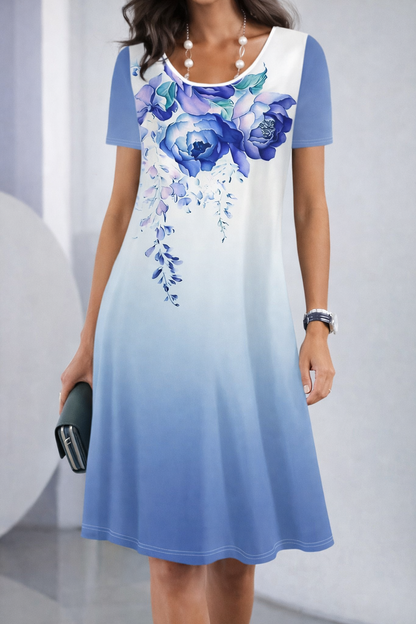 Vestido de verano de largo medio con estampado floral de Isabella Sol