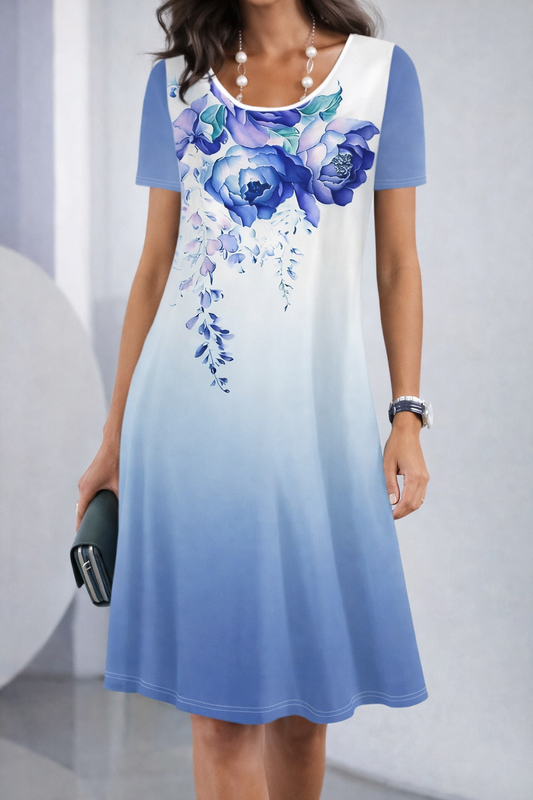 Vestido de verano de largo medio con estampado floral de Isabella Sol