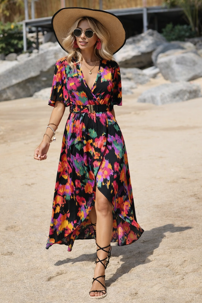 Vestido asimétrico con escote en V de Isabella Sol.