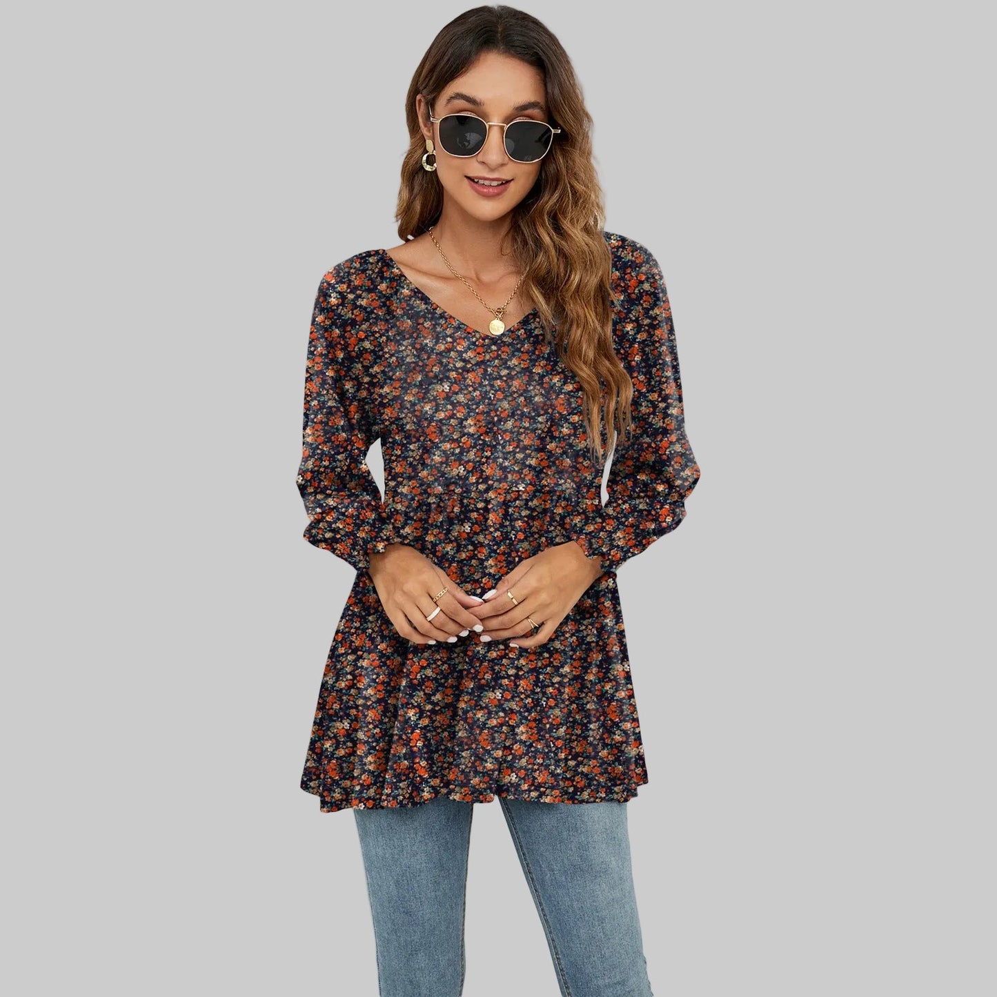 Top con cuello en V y mangas abullonadas con estampado floral de Isabella Sol.