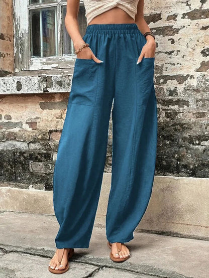 Pantalones harem de corte relajado Isabella Sol con bolsillos
