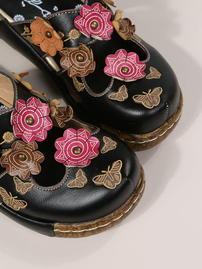 Sandalias de punta redonda con estampado floral bohemio de Isabella Sol