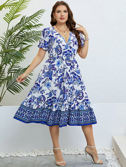 Vestido midi floral con escote en V de Isabella Sol