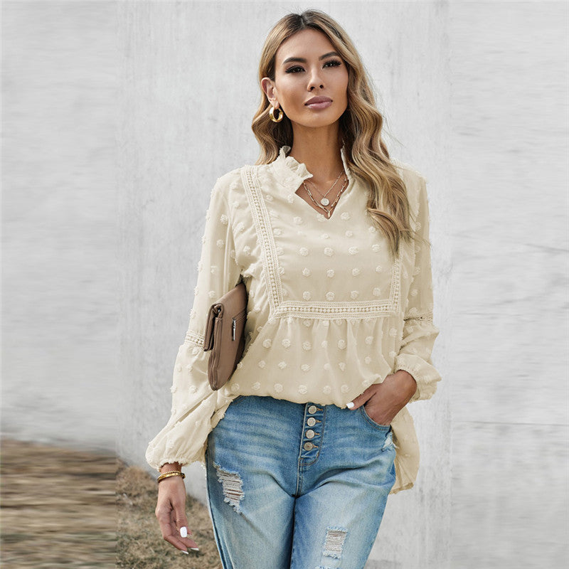 Blusa elegante de encaje con escote en V de Isabella Sol