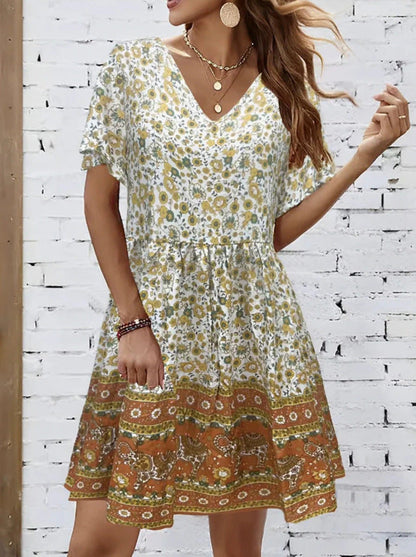Vestido de verano con escote en V y estampado floral de Isabella Sol.
