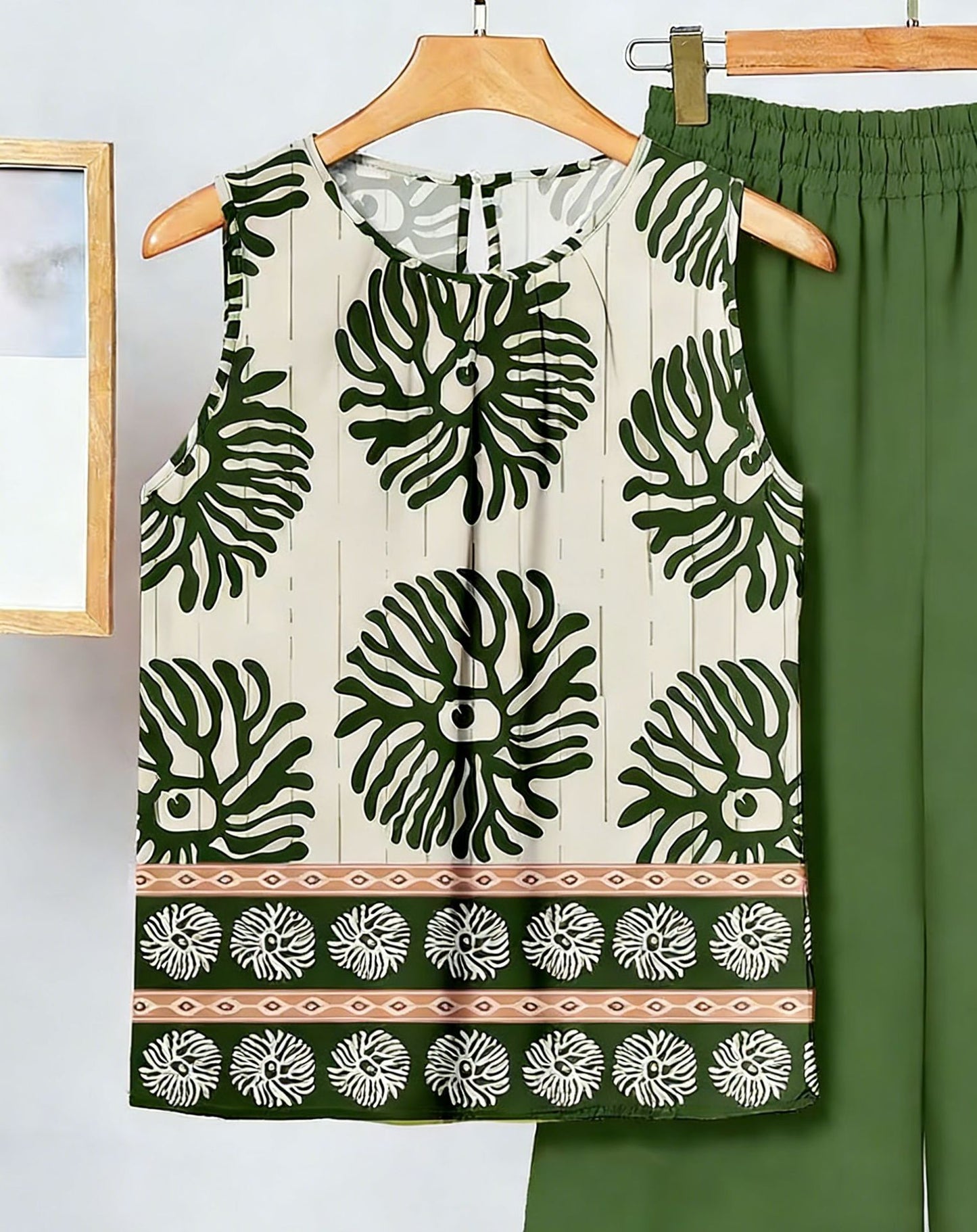 Conjunto de dos piezas para mujer: top sin mangas irregular y pantalón estampado a la moda.