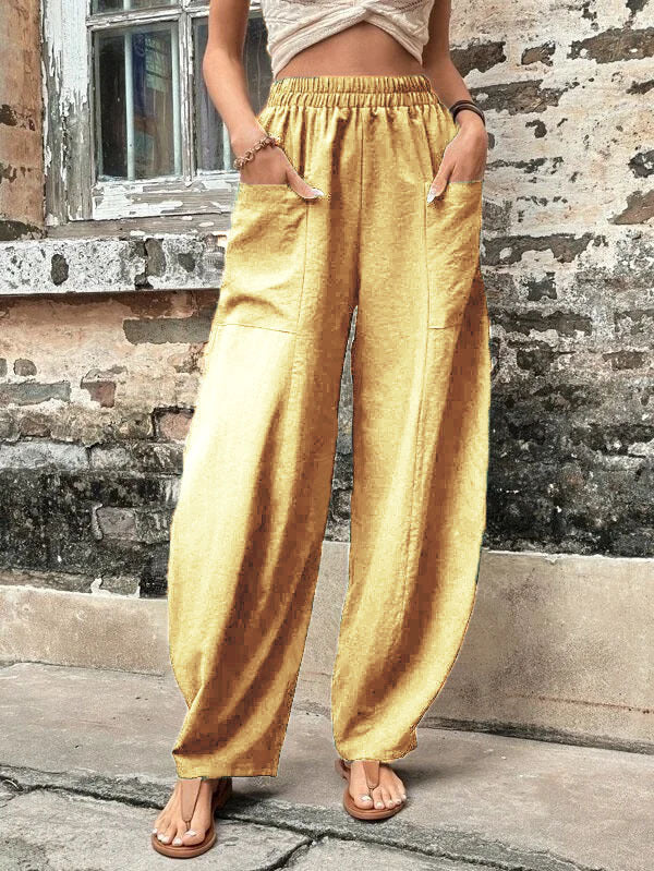 Pantalones harem de corte relajado Isabella Sol con bolsillos
