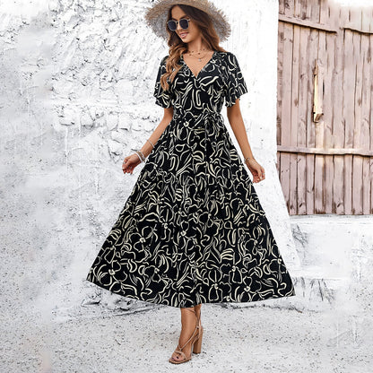 Elegante vestido midi geométrico de manga corta de Isabella Sol
