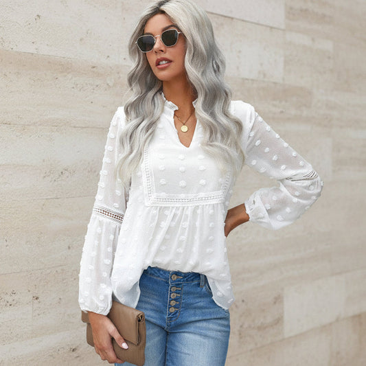 Blusa elegante de encaje con escote en V de Isabella Sol