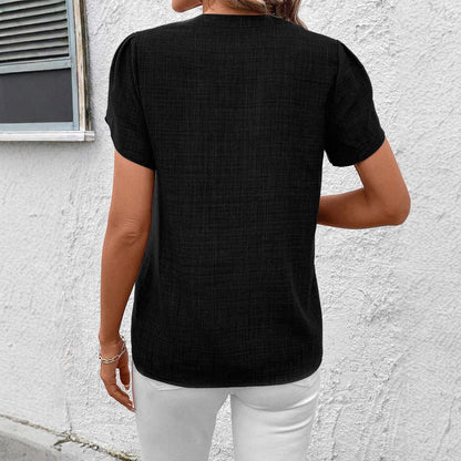 Blusa elegante estampada Isabella Sol con pliegues en los hombros.
