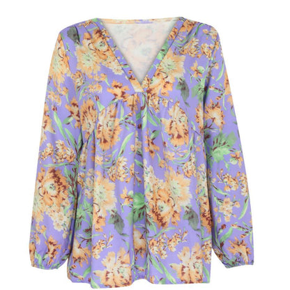 Blusa de manga larga Isabella Sol con estampado floral vibrante
