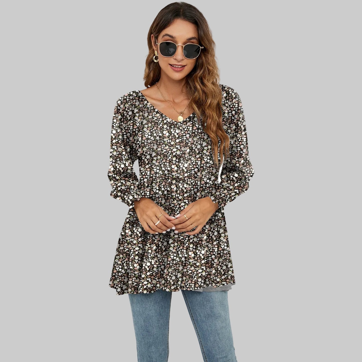 Top con cuello en V y mangas abullonadas con estampado floral de Isabella Sol.