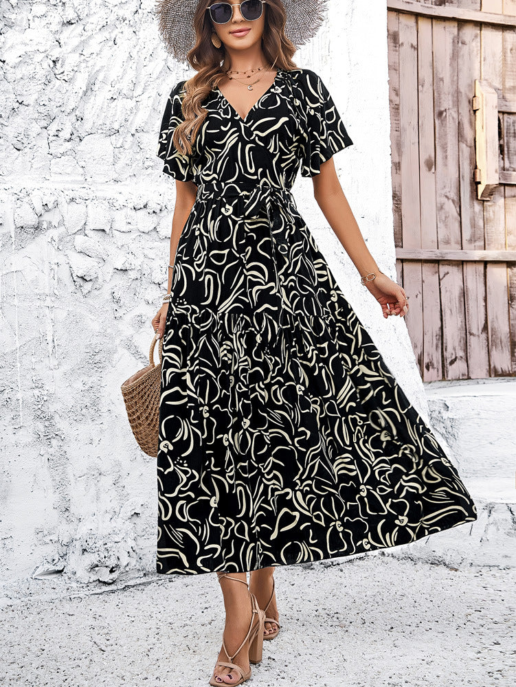 Elegante vestido midi geométrico de manga corta de Isabella Sol