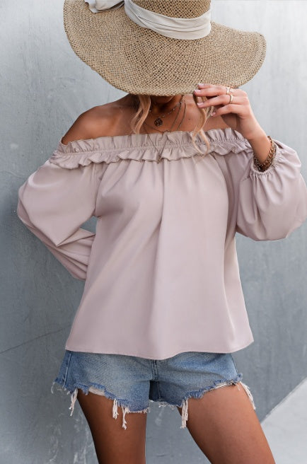 Elegante top de manga farol con hombros descubiertos de Isabella Sol
