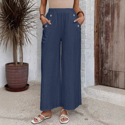 Pantalones holgados de talle alto y pierna ancha de Isabella Sol.
