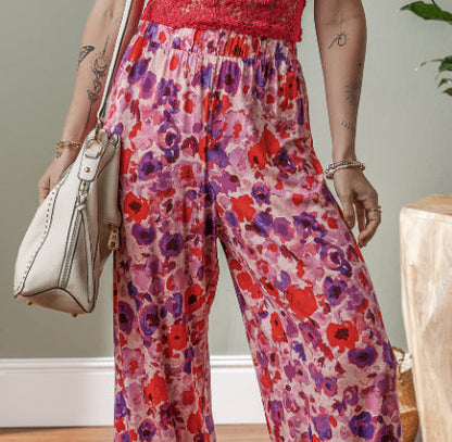 Pantalones de talle alto con estampado floral vibrante de Isabella Sol.
