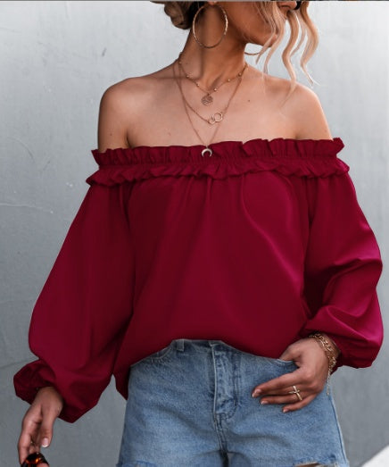 Elegante top de manga farol con hombros descubiertos de Isabella Sol