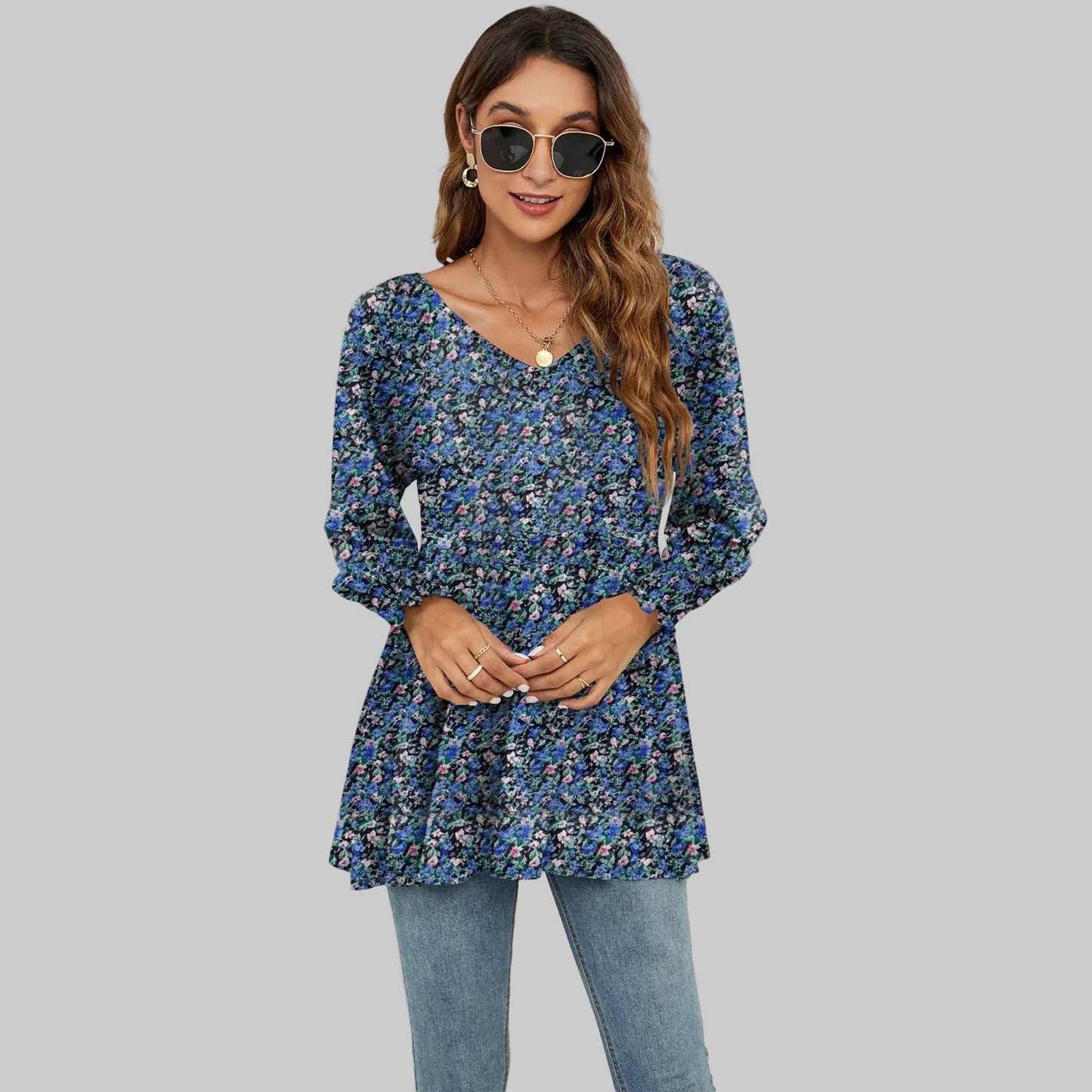 Top con cuello en V y mangas abullonadas con estampado floral de Isabella Sol.